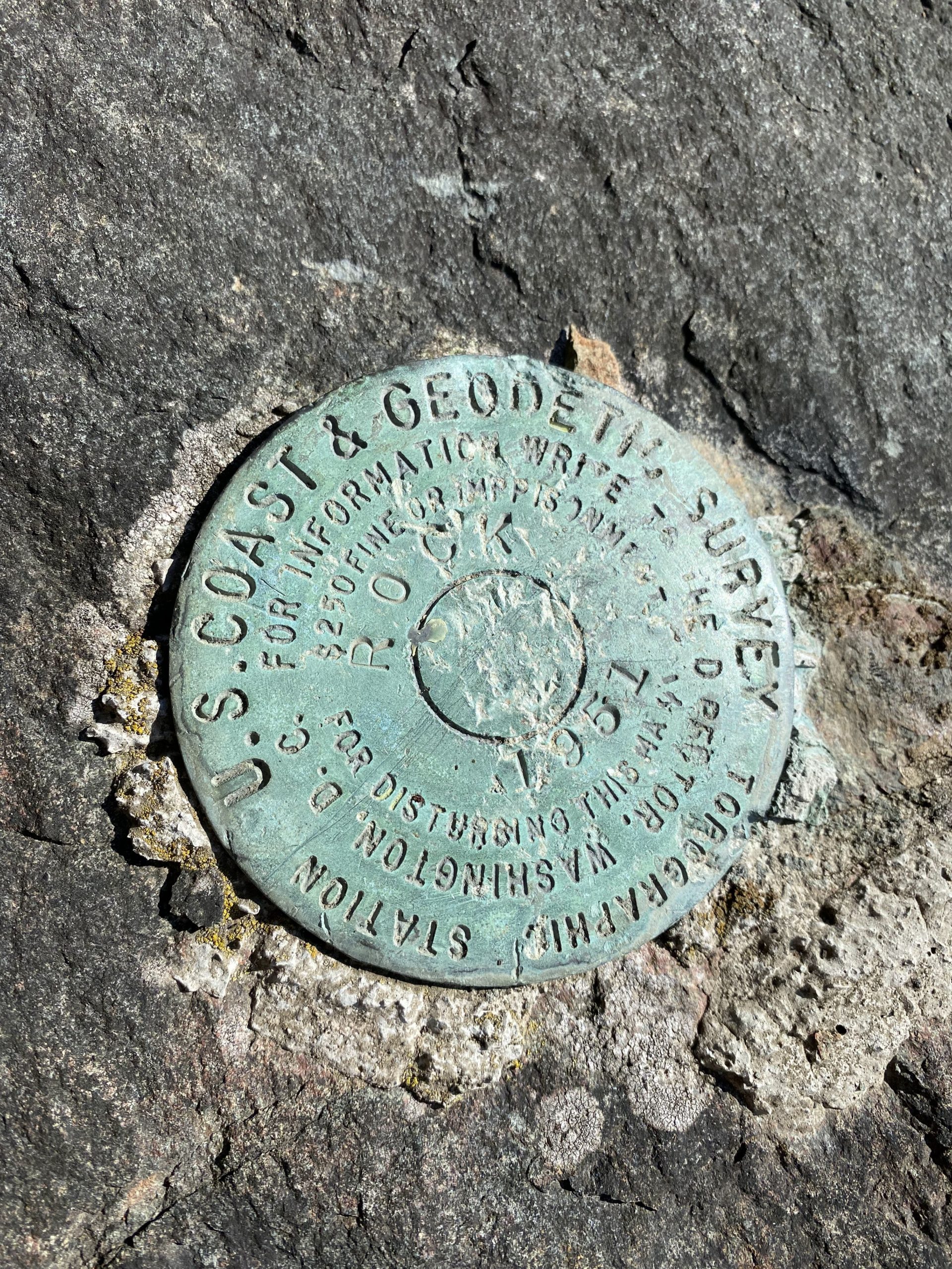 benchmark in a rock